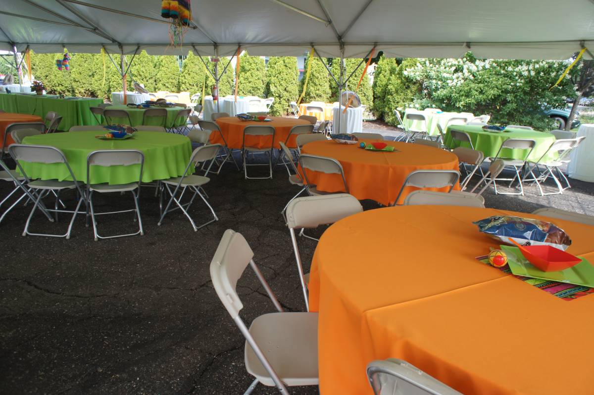 90" Round Orange Solid Tablecovers On 60" Round Tables